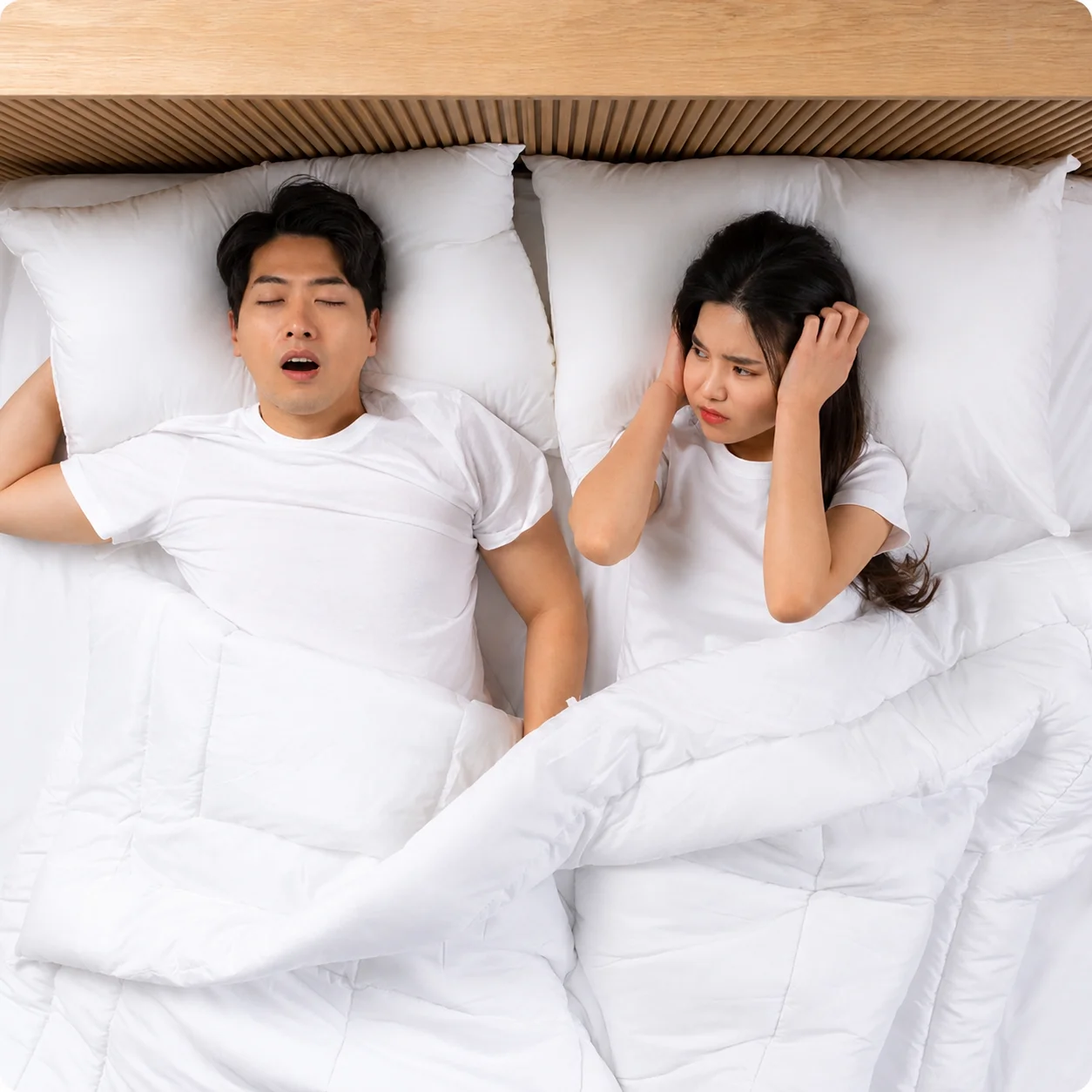 코골이 때문에 잠을 설치는 부부
